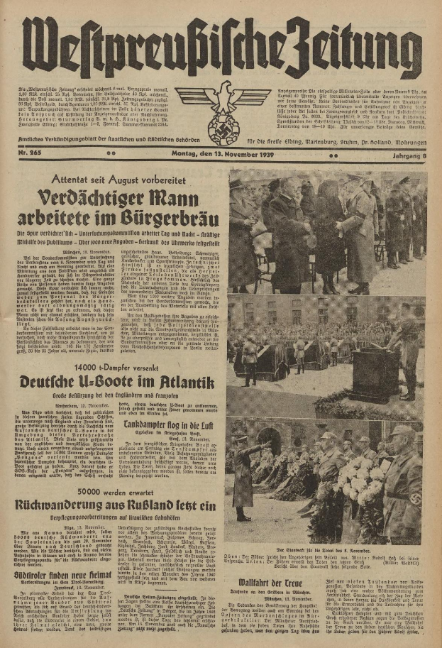Schwarze Titelseite einer deutschen Zeitung vom 13. November 1939 mit der Schlagzeile "Weitpreubliche Zeitung" und einem Foto von Menschen in traditioneller deutscher Tracht, die zu feiern scheinen.