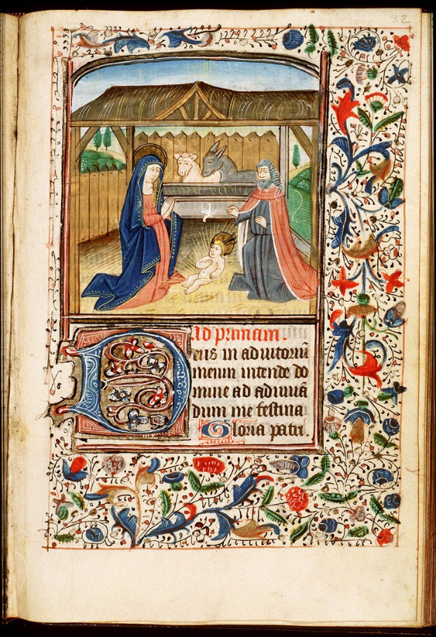 Ein farbenfrohes illuminiertes Manuskript zeigt die Krippe mit Maria, Josef und dem Baby Jesus in einem Stall, umgeben von Tieren, Pflanzen und Blumen, detailreich und farbenprächtig dargestellt.